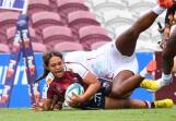 Exciting teenage Queensland centre Shalom Sauaso has been included in the Wallaroos squad. (Jono Searle/AAP PHOTOS)