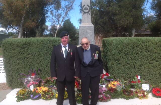 IMPORTANT: Merriwa RSL Sub-Branch President Brian Boothe with one of the town's oldest returned servicemen, William George Walmsley, at the Cenotaph.