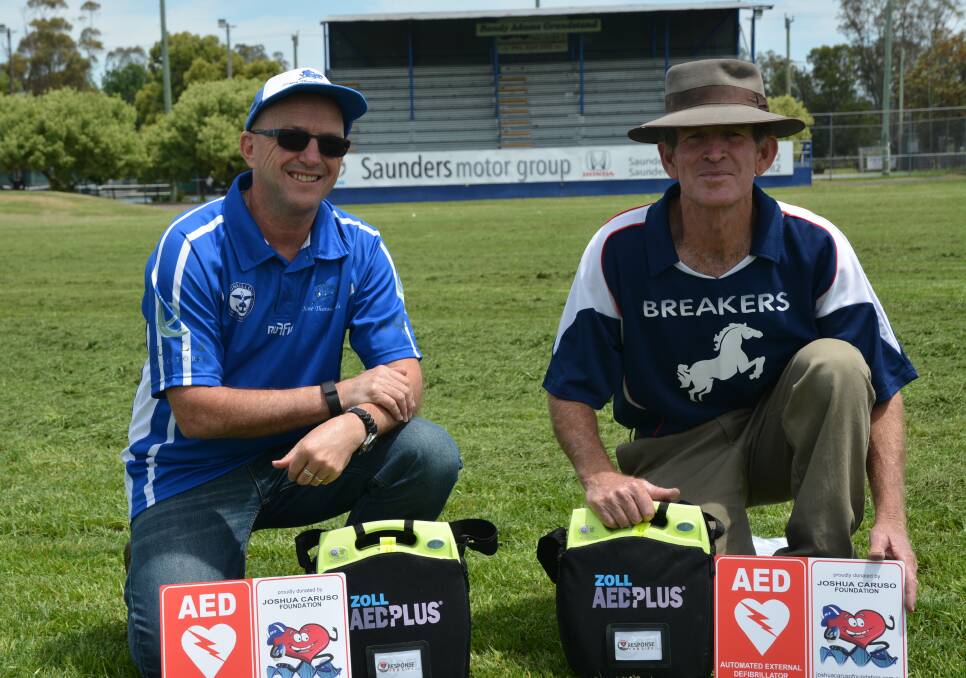 VITAL: Scone Thoroughbreds Rugby League Club representative David Casson at Scone Park on Tuesday with Scone Touch Football's Dave Macpherson.