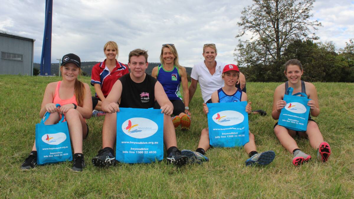 WELLBEING IN THE BAG: Georgia Watts, Ryan Clerke, Harry Schumaker, Saige Cust. Back: Bec Eveleigh of Upper Hunter Community Services, Sports Participation Officer Nicky Western and Sarah Green from the Rural Adversity Mental Health Program.