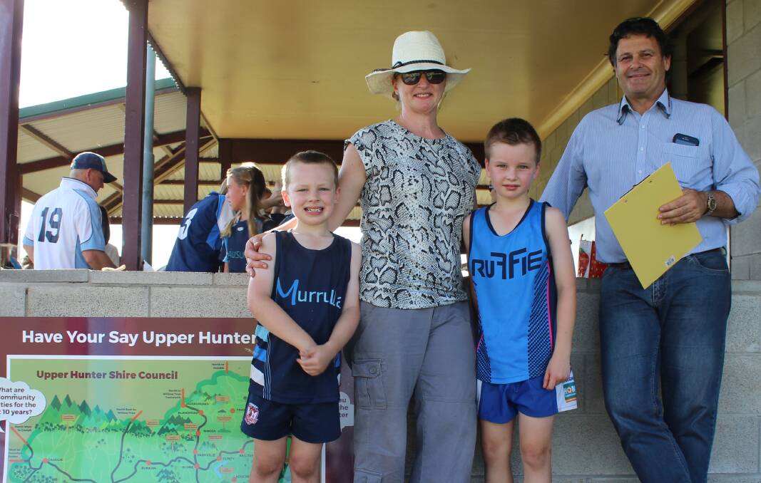 IMPORTANT: Melanie Cranfield, Eamon and Sam Gleeson took a few minutes to answer questions from Mayor Wayne Bedggood about the future of the shire at Scone Touch Football.