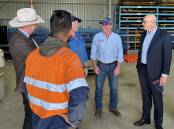 Peter Dutton and Barnaby Joyce meet with workers at Muswellbrook Steel Supplies yesterday. Pictures by Matthew Kelly