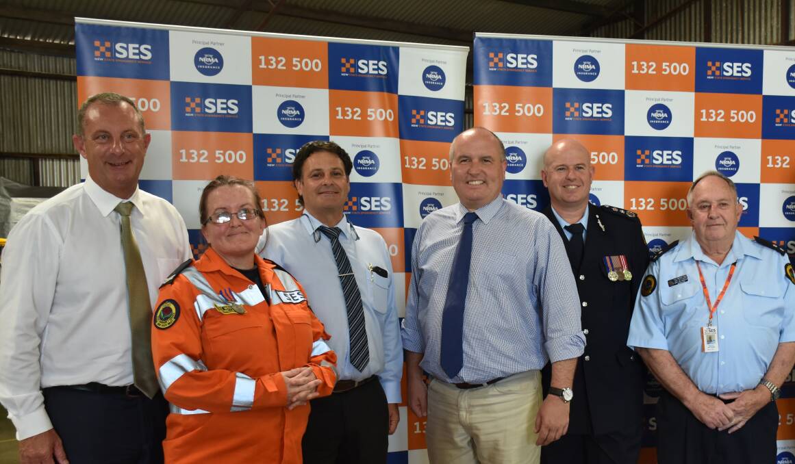 HAPPY: Upper Hunter MP Michael Johnsen; Muswellbrook SES member Kate Westaway; Upper Hunter mayor Wayne Bedggood; David Elliott MP, Minister for Corrections, Emergency Services and Veterans Affairs; SES Acting Commissioner Greg Newton; and Aberdeen SES Unit's Ray Butchard on Tuesday.