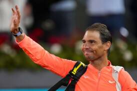 Spaniard Rafael Nadal waves to the crowd after losing to Jiri Lehecka at the Madrid Open. (AP PHOTO)