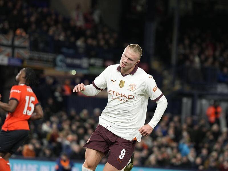 Erling Haaland wheels away after scoring the second in his five-goal FA Cup super show. (AP PHOTO)