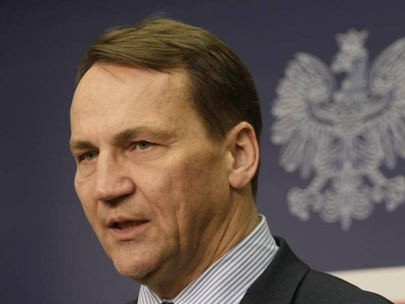 Foreign Minister Radek Sikorski says Poland should not exclude sending troops to Ukraine. (AP PHOTO)